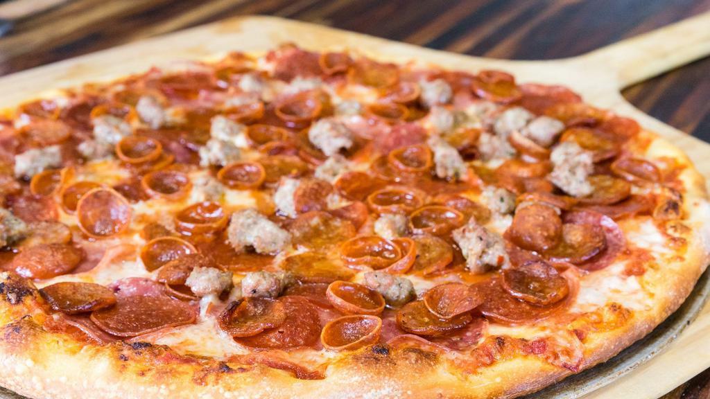 Meat Lovers · Starting with our beer-infused crust and then in-house marinara then we add canadian bacon italian sausage and pepperoni. it is then finished with sizzling bacon.