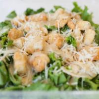 Caesar Salad · Romaine lettuce, parmesan cheese & croutons. Add chicken breast for an additional charge.