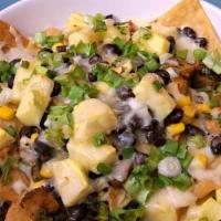 Top-Shelf Al Pastor Nachos · Bro, where’s my phone charger? Nachos loaded with al pastor, beans, nacho cheese, tomatoes, ...