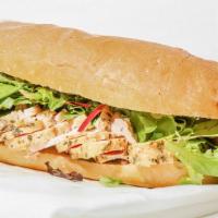 The Petto di Pollo Sandwich · Mediterranean Chicken Breast Rubbed with Garlic, Lemon Peel and spice, Swiss Cheese with Org...