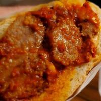 The Rompiballe Sandwich · Beef Meatballs Covered in Slightly Spicy Red Wine Marinara Sauce, Black Pepper and Melted Pr...