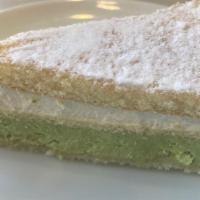 RICOTTA & PISTACHIO CAKE · Ricotta & pistachio creams separated by sponge cake, decorated with crushed pistachios & dus...