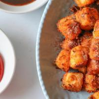 Paneer Pakora · Cottage cheese with chickpea batter comes with tamarind sauce.