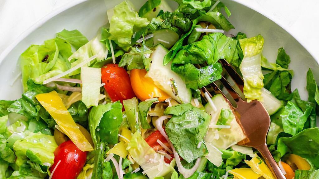 Mixed Green Salads · Spring mix, carrots, tomatoes, some fruits, and cheese.