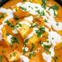 Butter Paneer · Cottage cheese, Indian spices cooked with a hint of butter, and homemade tomato sauce.