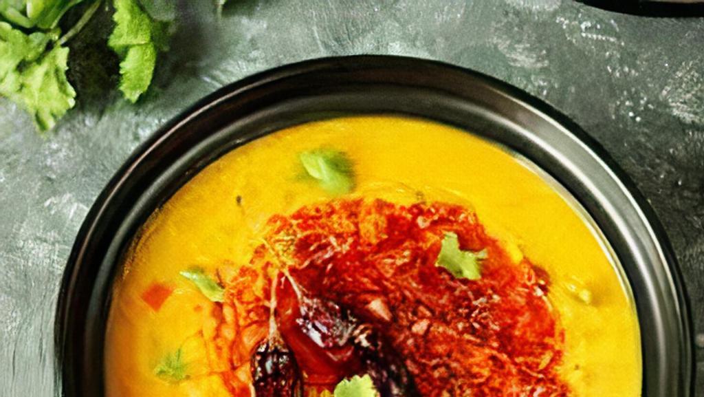 Daal Tadka · Split yellow lentil, curry leaf, Indian spices cooked with a hint of butter.