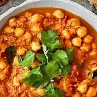 Chana Masala · Garbanzo, spices cooked with homemade tomato sauce.