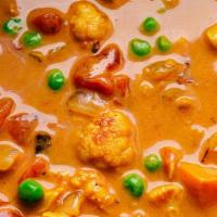 Veggie Curry · Mixed vegetables (cauliflower, green peas, green beans, potato, carrot) cooked with Indian s...