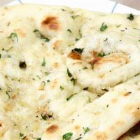 Garlic Cheese Naan · Naan stuffed with garlic and cheese.