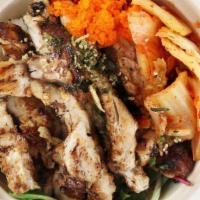 Grilled Chicken Bowl · Grilled soy ginger garlic chicken cooked to order, kimchi, pickled ginger, topped with black...