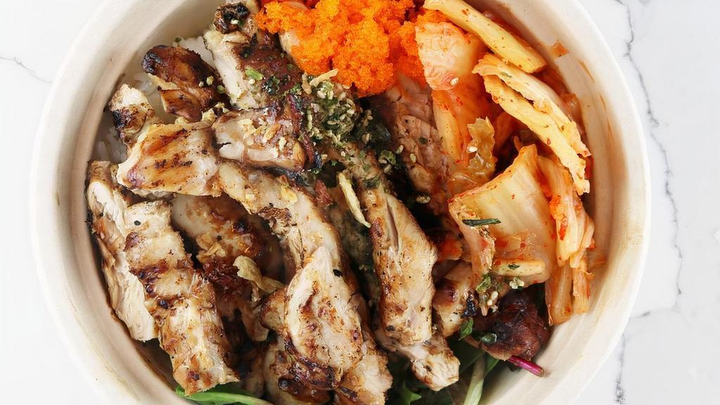 Grilled Chicken Bowl · Grilled soy ginger garlic chicken cooked to order, kimchi, pickled ginger, topped with black unagi, crispy onions, furikake, and green onion