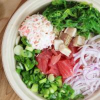 Tuna-Verse · Ahi tuna, spicy tuna, albacore, crab salad, seaweed salad, red & green onion, cucumber, citr...