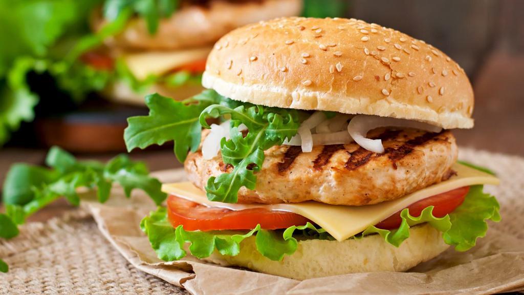 Grilled Chicken Sandwich · Sizzling grilled chicken breast. cheddar cheese, slices of tomatoes, red onions, crispy lettuce, mayonnaise on brioche bun