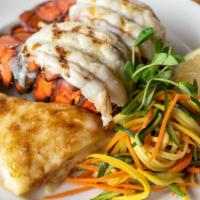 Lobster Tails (6 Oz.) · Twin tails, fall vegetables, mashed potatoes, drawn butter, lemon.