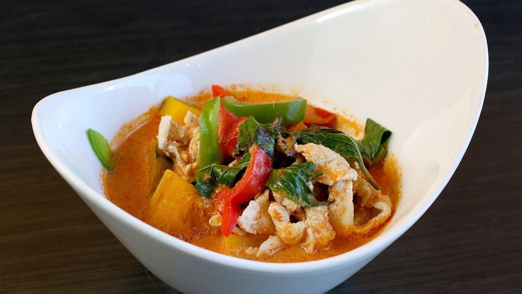 Pumpkin Curry · Choice of tofu + vegetable, chicken, beef or pork with kabocha squash, bell peppers, basil leaves in red curry sauce served with white rice.