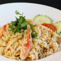 Crab Fried Rice · Fresh snow crab, crab claw, egg, white and green onion.