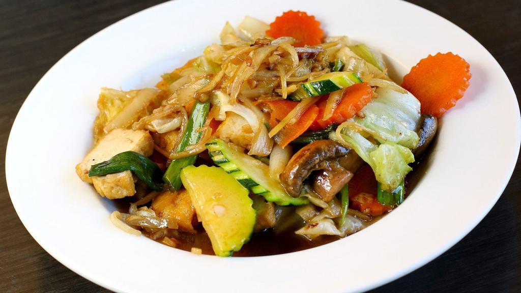 Thai Sukiyaki · Pan fried silver noodles (low carb), chicken and prawns, Napa cabbage, cabbage, celery, broccoli, carrot and egg served with spicy sesame sauce on the side.