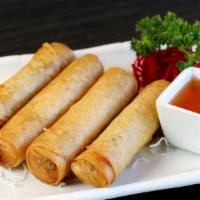 Crispy Vegetarian Rolls · Silver noodles, cabbage, and carrot served with sweet and sour plum sauce.