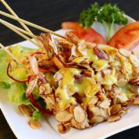 Almond Prawn · Crispy seasoned tiger prawn rolled in slices of fresh almond and served with creamy lemon sa...