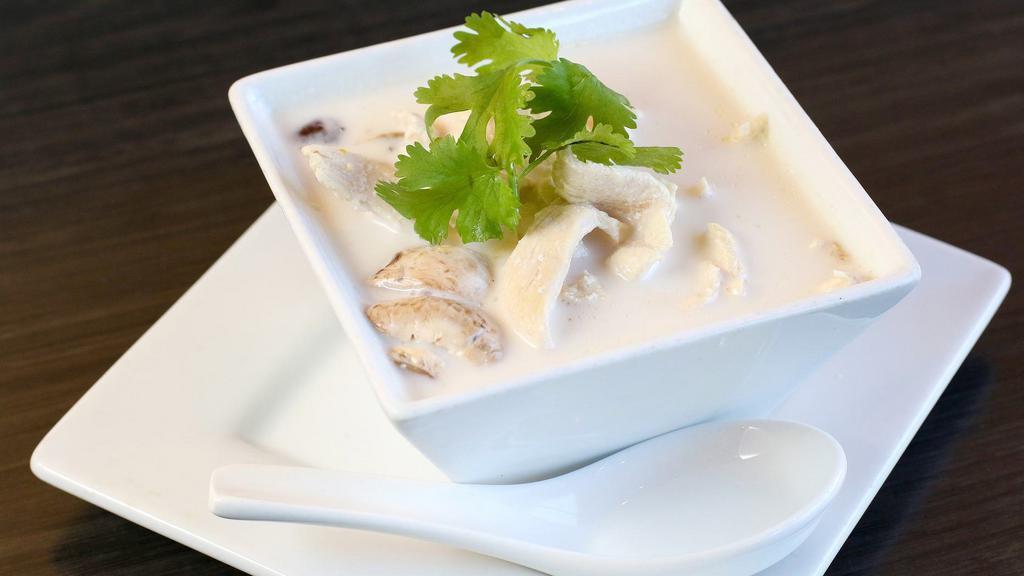 Tom Kha (Cup) · Coconut milk soup with galangal, kaffir lime leaves, mushroom and lemon juice.
