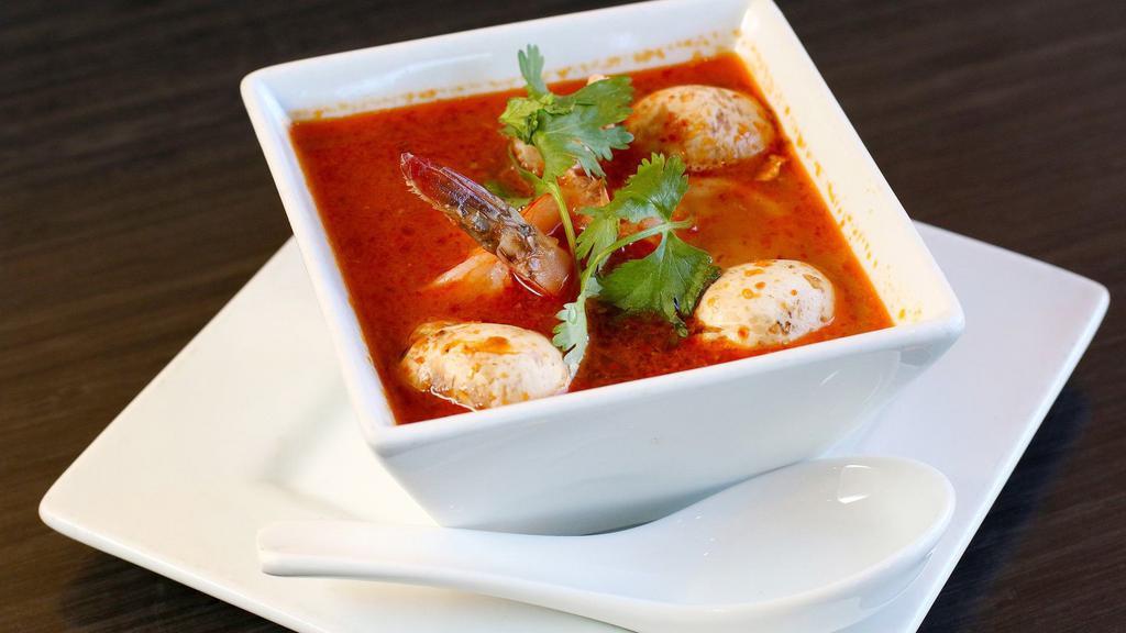 Tom Yum (Cup) · Spicy and sour lemongrass soup with galangal and kaffir lime leaves. Served with mushroom, tomato, cilantro, and lemon juice.