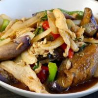 Spicy Eggplant · Eggplants, bell peppers, onion, basil leaves in chili and garlic sauce  served with white ri...