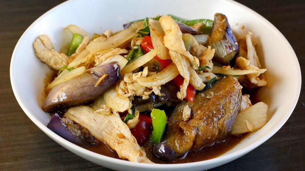Spicy Eggplant · Eggplants, bell peppers, onion, basil leaves in chili and garlic sauce  served with white rice.