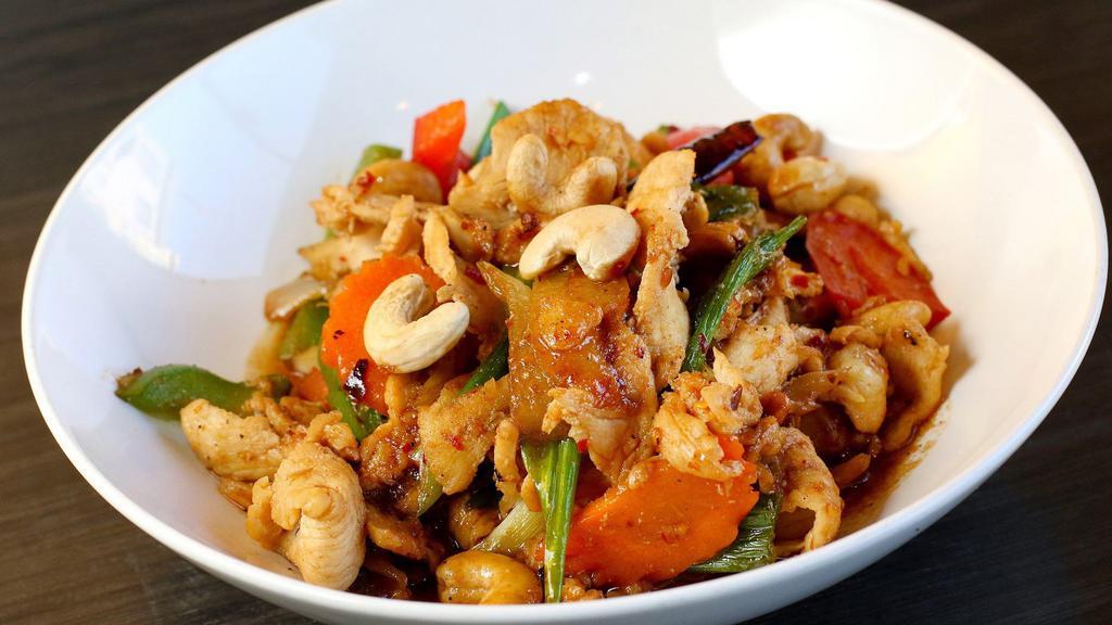 Cashew Nut · Cashews, onions, green onion bell peppers with Thai smoky chili sauce  served with white rice.