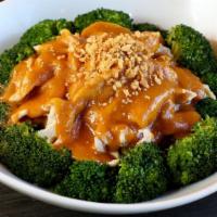 Param · Steamed spinach and broccoli topped with homemade peanut sauce  served with white rice.
