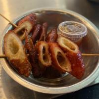 S5. Fried Pig Intestine / 香脆炸大腸 · One of our most popular snacks! Two skewers of crispy intestines served with a side of plum ...