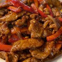 W6. Szechuan Pepper Beef · Tender beef slices stirred with red chili peppers. Mildly spicy, delicious!