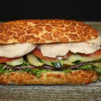 Ranch Chicken Breast · Served with ranch dressing, chicken breast, lettuce, pickle, tomato, peppercini,  onion, cuc...