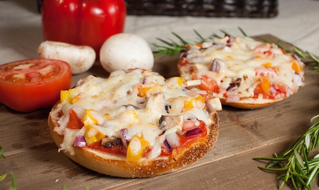 Pizza Supreme · Marinara sauce, bell peppers, onions, tomato & mozzarella cheese.