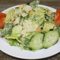 Caesar Salad · Romaine lettuce, crouton, parmesan cheese tossed with caesar dressing served with cucumber a...