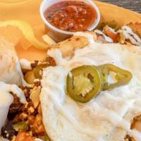Chorizo · Chorizo, queso fresco, onions, and tomato, topped with sour cream and avocado with a side of...