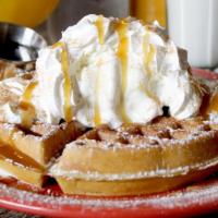 Churro Waffle · Topped with cinnamon, powdered sugar and caramel. Served with a scoop of vanilla bean ice cr...