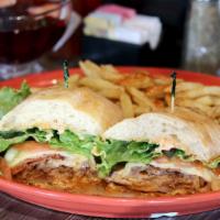 Cajun Chicken Sandwich · Spicy Cajun style grilled chicken, lettuce, swiss cheese, tomato, applewood smoked bacon, gr...