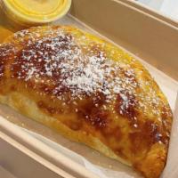 Aji de Gallina Empanada · Crispy, flakey, savory chicken pastry served with Chile Rocoto Aioli.