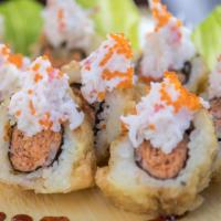 Crown Spicy Tuna · Deep fried spicy tuna roll topped with crab meat and tobiko.