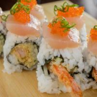 Giant · Deep fried shrimp, crunchy, cucumber, topped with white tuna, ponzu sauce, green onions tobi...