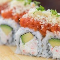 Volcano · California roll topped with spicy tuna and crunchy.
