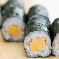 Tamago Roll · Layered cooked egg.