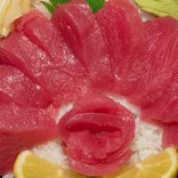 Tekka Donburi · Tuna sashimi over sushi rice. Served with salad and miso soup.