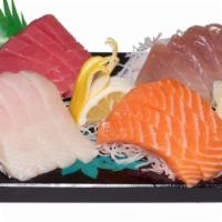 Yo Sashimi Combo · Each four pieces of tuna, salmon, hamachi, white tuna. Served with soup and rice.