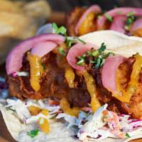 Mango Habanero Fish Tacos (3) · Beer-battered cod, Mango Habanero sauce, coleslaw, pickled red onion, cilantro, corn tortill...