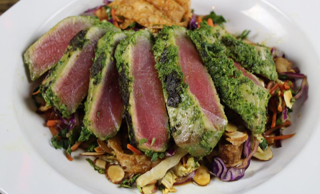 Seared Ahi Salad · Seared ahi marinated in chimichurri, Asian slaw, toasted almonds, wonton strips, cilantro, soy vinaigrette.

Consuming raw or undercooked meats, poultry, seafood, or eggs may increase your risk for foodborne illness.