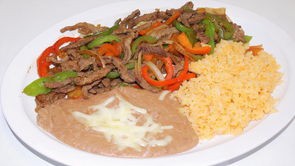 Chicken Fajitas · All plates include rice beans and tortillas