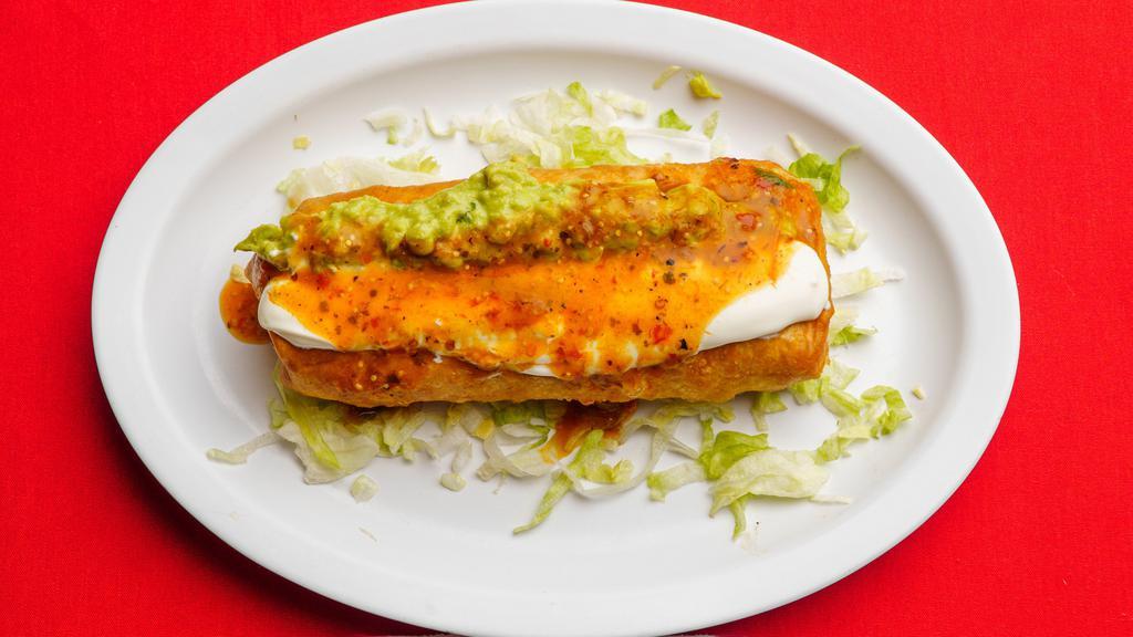 Chimichanga · Deep fried burrito. choice of meat with rice, beans topped with guacamole and sour cream.