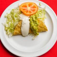 Crispy Taco · crispy corn tortilla with meat, lettuce,cheese, sour cream and guacamole.