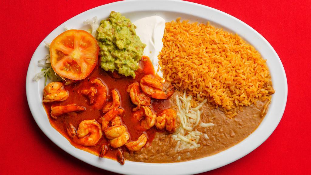 Camarones a la Diabla · Shrimp with hot red sauce. served with rice, re- fried beans,lettuce,guacamole,cheese,sour cream and corn or flour tortillas